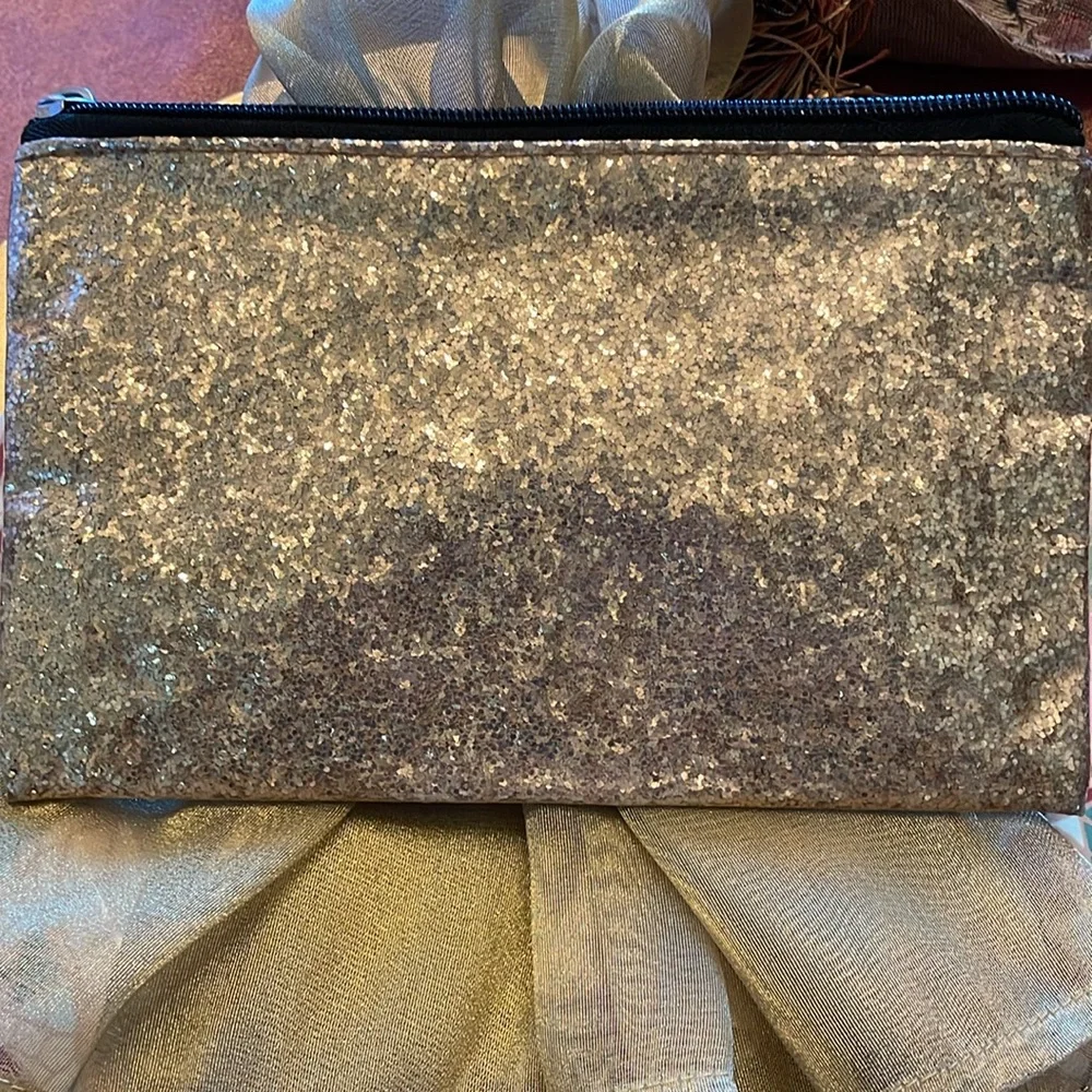 Gold metallic top zip cosmetic or inside purse bag. GUC “Hello Gorgeous”